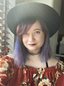 picture of a young woman wearing a hat